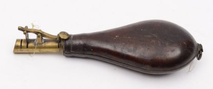 A leather shot flask: of typical form, the brass nozzle having adjustable measure.