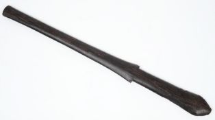 A Native hardwood club: of flattened spear shaped outline, 77cm. long.