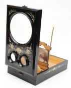 A late Victorian ebonised and handpainted  Graphoscope:,