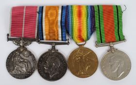 A George VI British Empire group of four '45462 Pte W C W Cartwight, Suffolk Regiment':,