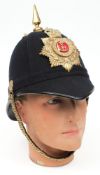 A Royal Berkshire Regiment blue cloth helmet:, gilt spike with rosette mounts over helmet plate,