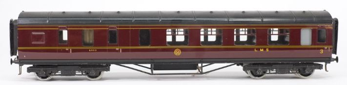 Exley, a 3rd/brake passenger corridor coach:, in LMS maroon livery.
