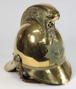 An Edwardian brass Merryweather pattern  Fireman's helmet:,