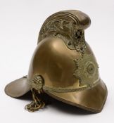 An Edwardian brass Merryweather pattern fireman's helmet:,