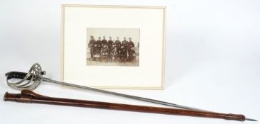 A Victorian Officer's dress sword together with a photograph of Duke of Cornwall Regiment A-1 with