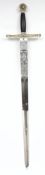 A reproduction sword:, the blade etched with King Arthur design and Toledo excalibur.