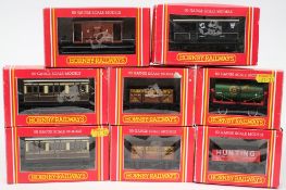 Eight Hornby goods wagons, various liveries, boxed:.