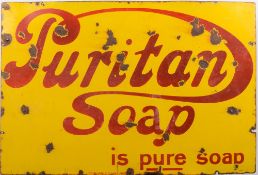A 'Puritan Soap is Pure Soap' enamel advertising sign:, red lettering on yellow background,