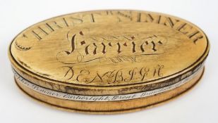 An 18th century horn oval snuff box,:, the cover inscribed 'Christr Simner Farrier, Denbigh',