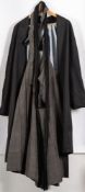 An early 20th century Japanese gentleman's black silk wedding Haori and Hakama:.