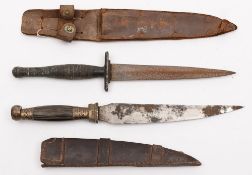 A Fairbairn style sheath knife:, 17cm double edged blade,