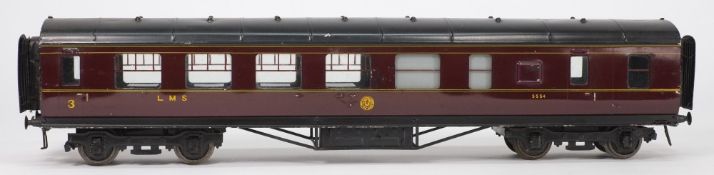 Exley, a 3rd/brake passenger corridor coach:, in LMS maroon livery.