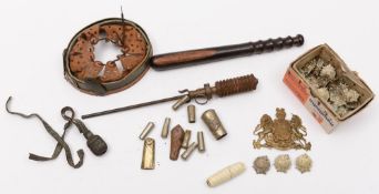 A collection of  London Rifle Brigade cap badges, a Mk 3 rifle grenade,