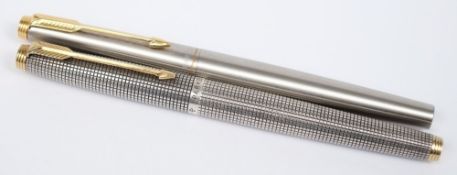 A  sterling silver Parker 75 with milled case, together with a stainless steel Parker 75:,