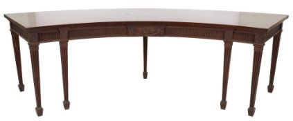 A George III mahogany sideboard table:, of arc outline with a plain top,