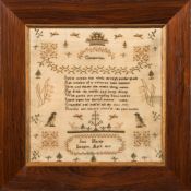A mid 19th century needlework sampler: with central verse and traditional designs of trees,