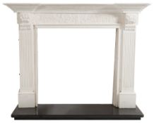 A white painted wood fire surround:, the mantel shelf of recessed breakfront outline,