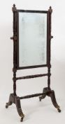 A Regency mahogany and inlaid swing frame cheval mirror:,