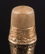 A late 19th century gold thimble: with engraved mountain landscape scene and inscribed 'May