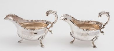 A matched pair of George III silver sauce boats, maker's mark to one WP, the other WS, London,