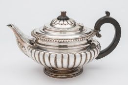 A George IV silver circular teapot, maker Charles Thomas Fox, London, 1826: crested,