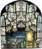 A 19th century stained leaded glass panel:, of arched outline,