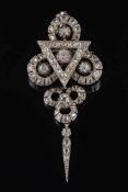 A late 19th century diamond mounted pendant brooch: of openwork trefoil design with matching drop.