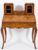 A Victorian walnut, inlaid and gilt metal mounted lady's writing desk:,