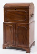 An early 19th Century mahogany domed trunk-shaped cellarette cabinet:,