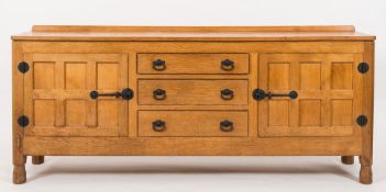 A collection of 'Lizardman' oak dining room furniture:,