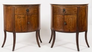 A pair of Regency mahogany and inlaid half round enclosed washstands:, bordered with ebonised lines,
