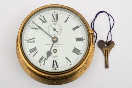 A brass bulkhead clock by Sestral for Negretti and Zambra Ltd, London:,
