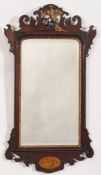 A late 19th Century mahogany, inlaid and partly gilt fret cut mirror in the Georgian taste:,