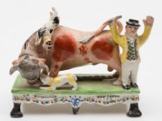 A late Staffordshire 'Bull Baiting' group: in the style of Obadiah Sherratt,