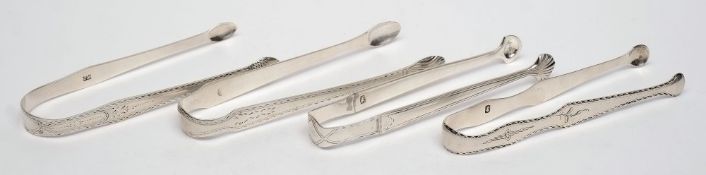 A pair of Georgian silver sugar tongs, maker C H: initialled,