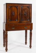 A 19th Century military mahogany and brass bound writing desk on a later stand:,