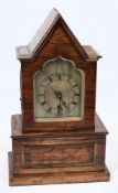 An English Regency rosewood mantel clock: the eight-day duration,