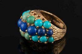A gold, turquoise and lapis lazuli cluster ring: with 21 graduated stones,