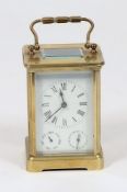 An Edwardian French carriage clock with subsidiary dials: the eight-day duration timepiece movement