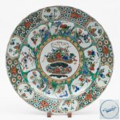 A Chinese famille verte charger: with shaped rim,