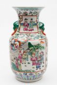 A Canton porcelain vase: of baluster form with grotesque mask and ring handles,