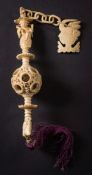 A 19th century Cantonese ivory puzzle ball suspension:, with carved fish hook,