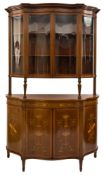 An Edwardian mahogany and marquetry serpentine fronted display cabinet:, now in two sections,
