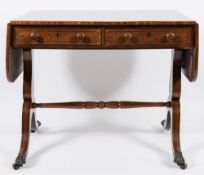 A Regency mahogany and inlaid sofa table:, bordered with ebonised lines,