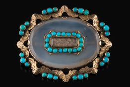 A mid 19th century turquoise mounted chalcedony brooch: with central hair compartment.