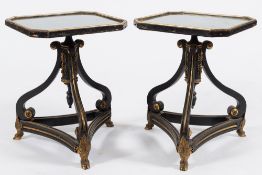 A pair of ebonised, gilt decorated and brass mounted occasional tables in the Regency taste:,