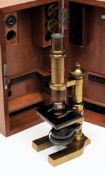 An early 20th Century Leitz Wetzlar lacquer brass monocular microscope:,