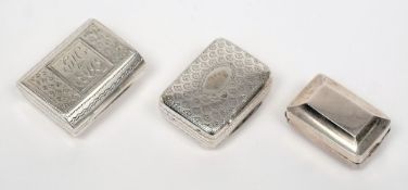 Three small 19th century silver vinaigrettes, various makers and dates: all of rectangular outline,