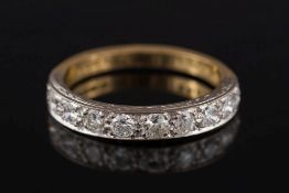 An 18ct gold and diamond ten-stone half-eternity ring: with brilliant-cut diamonds weighing a total