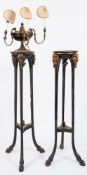 A pair of Regency carved giltwood and ebonised circular jardiniere stands:,